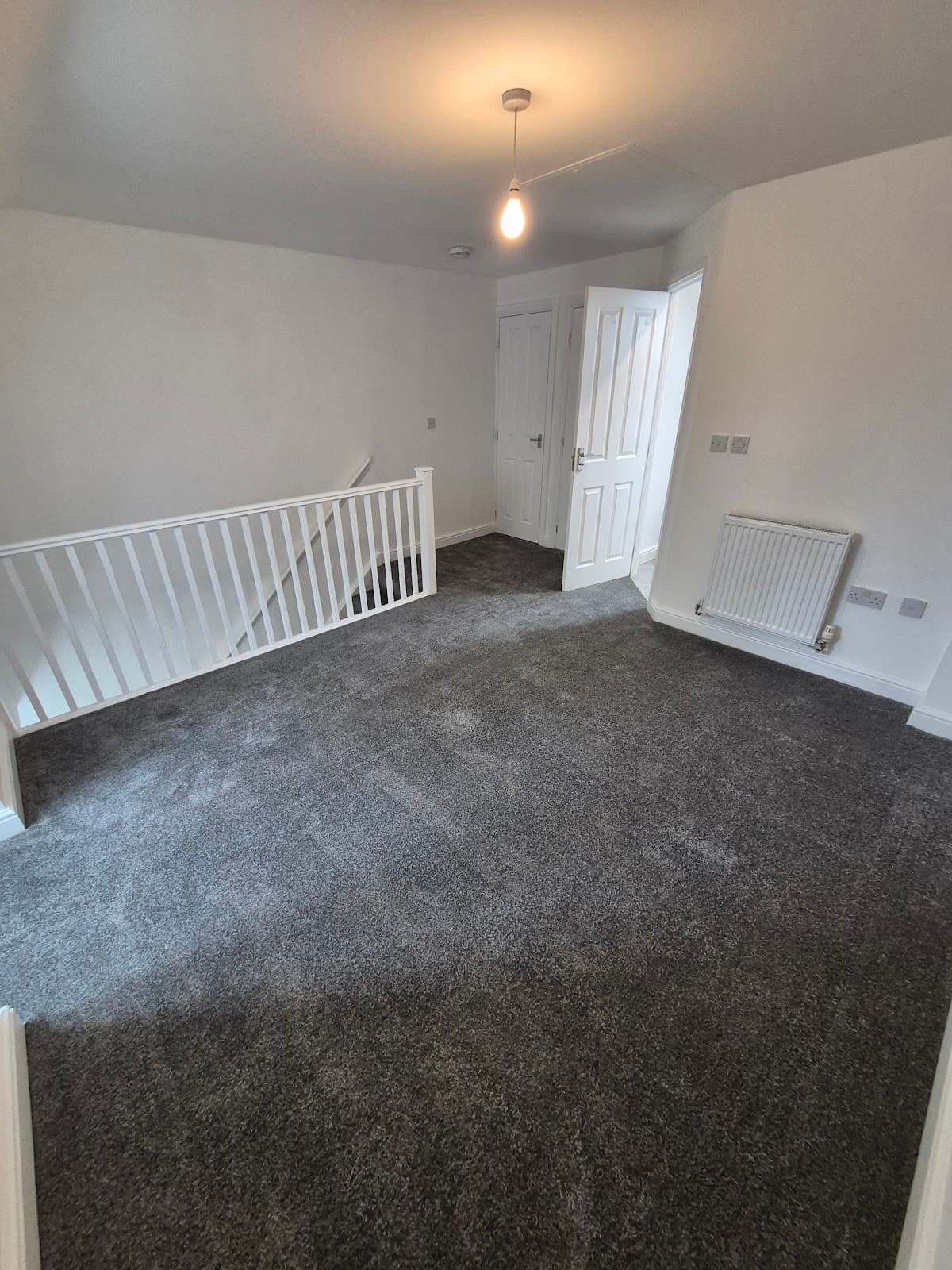 After — New carpet fitted across the landing and stairs by LWR Group, Lincoln
