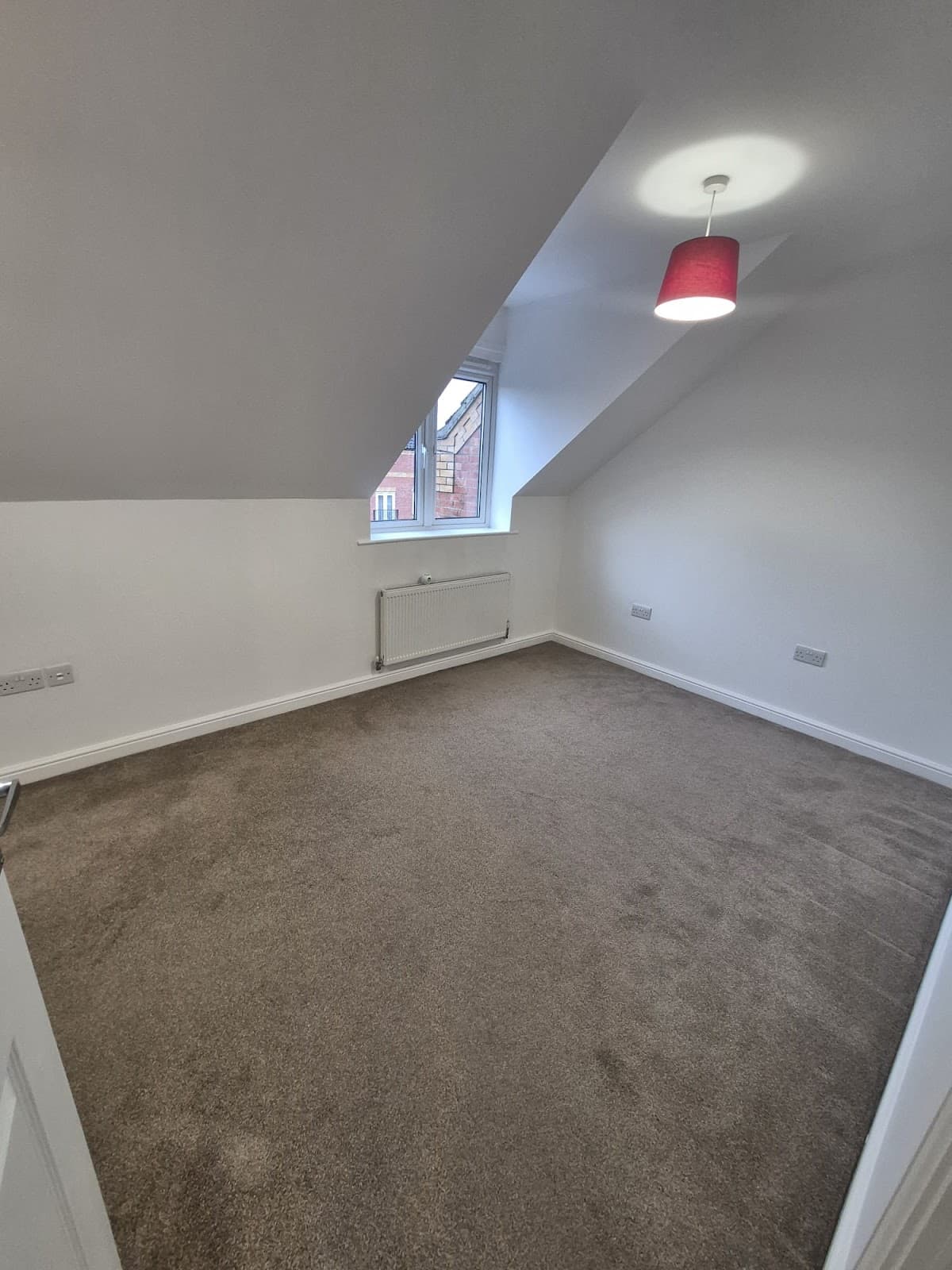 After — Full renovation at St James Place, Lincoln — loft bedroom freshly decorated with new carpet