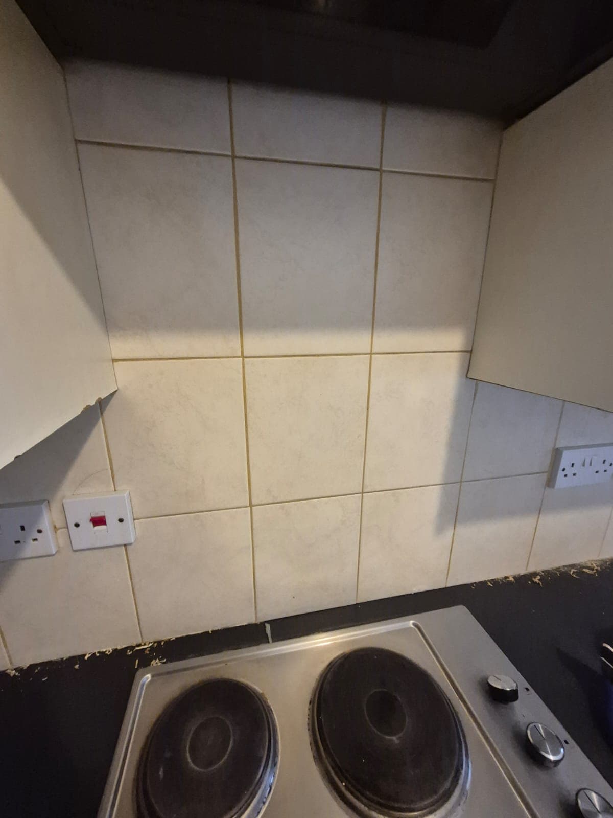 Before — Tiling work required, damaged or missing tiles in Lincoln rental property