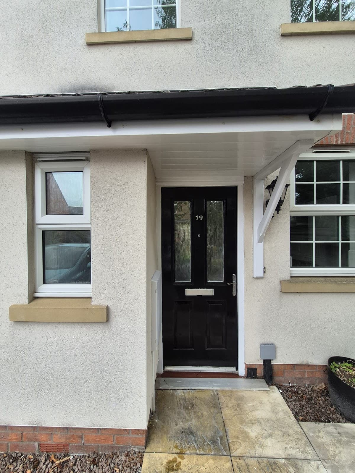 After — Refurbished property exterior at Witham Mews, Lincoln — new composite front door and porch canopy