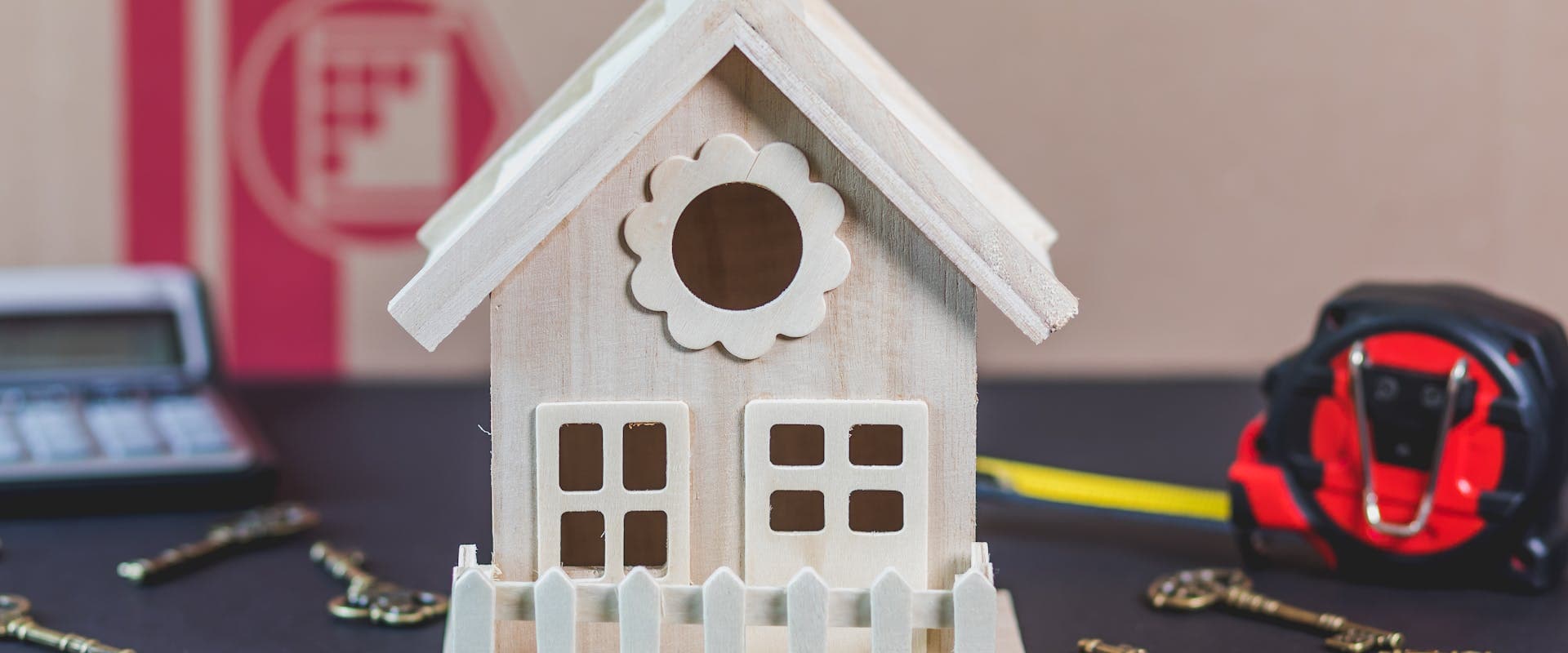 House keys and miniature home — UK landlord responsibilities checklist