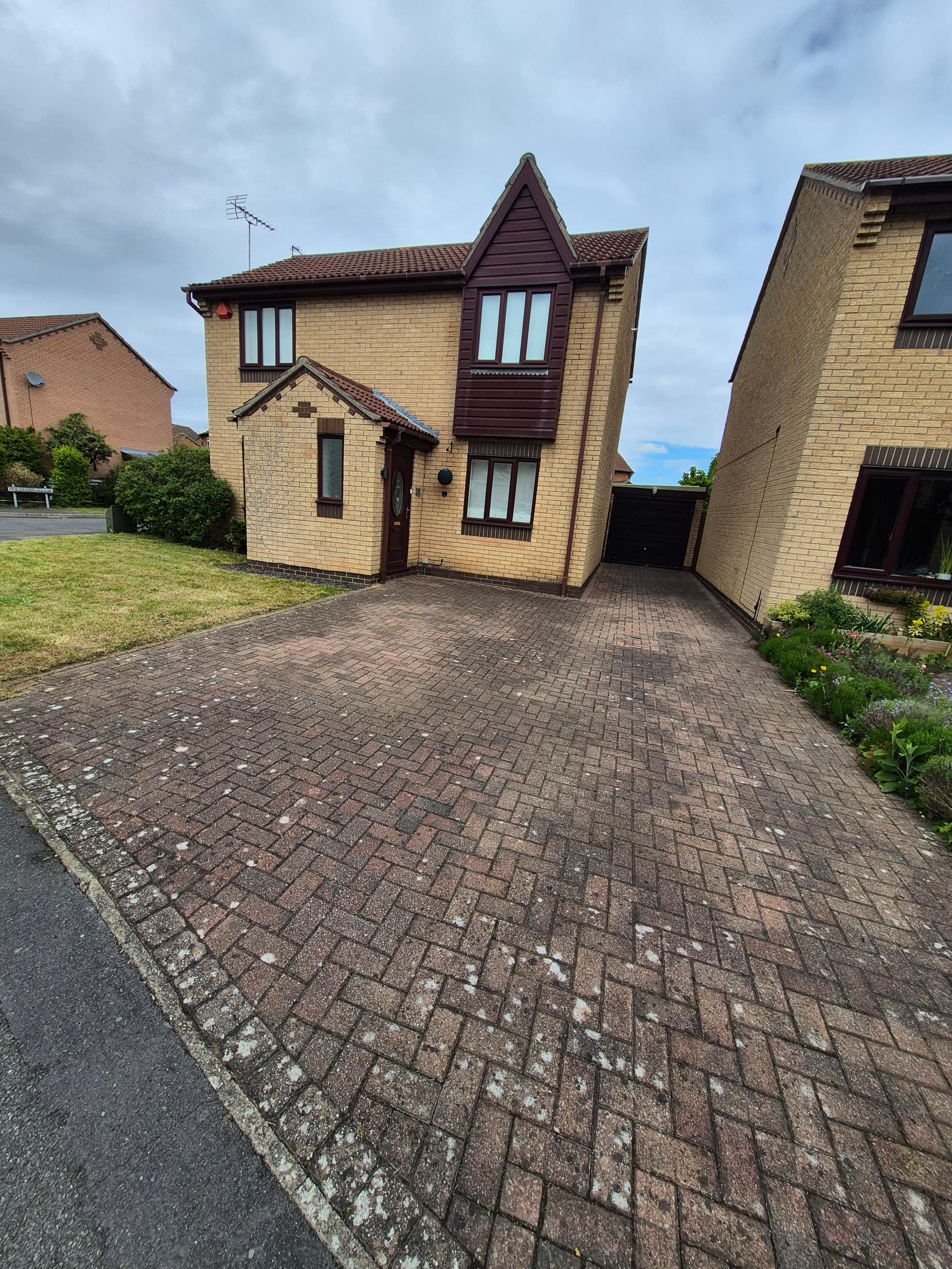 Tidy exterior of a Lincoln rental property after LWR Group grounds and driveway maintenance, with clean paved frontage ready for new tenancy