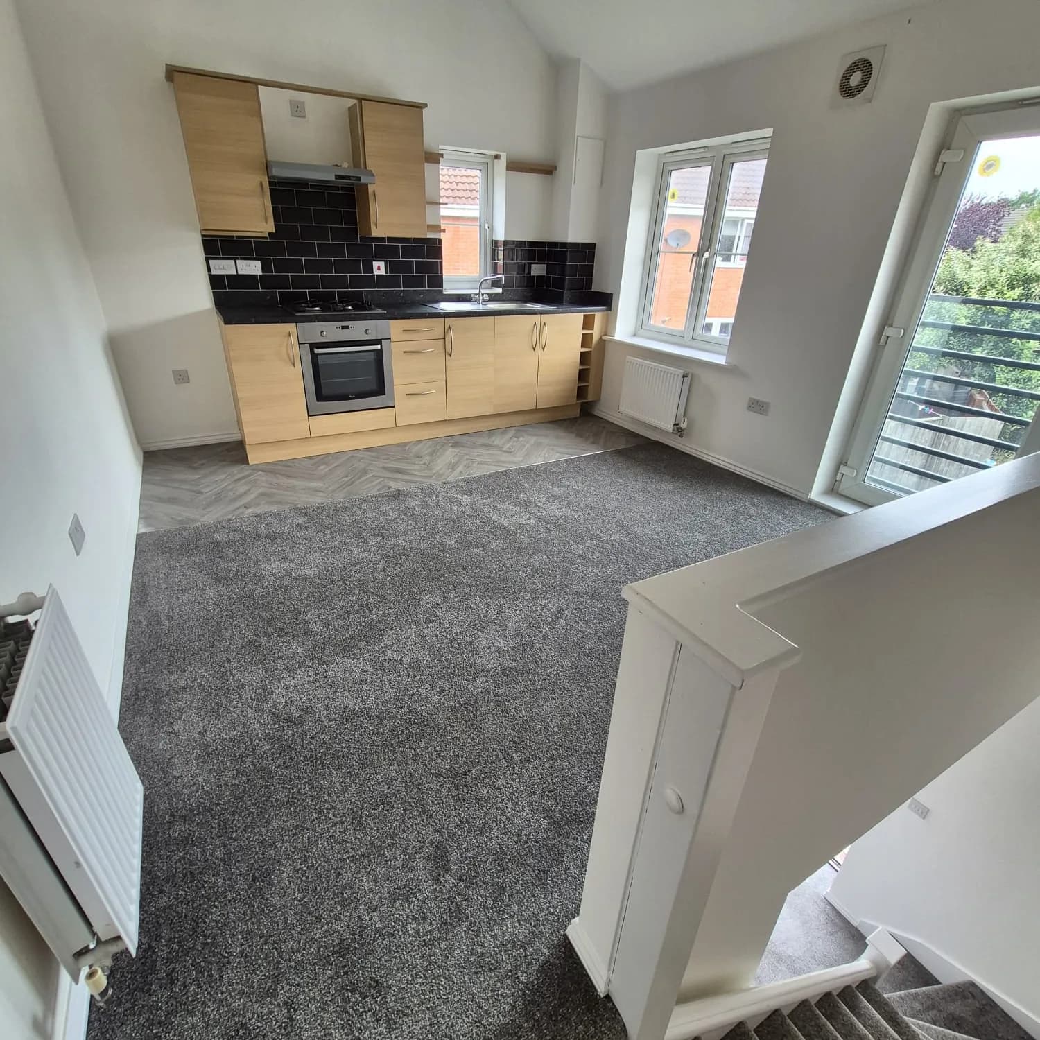 A Lincoln rental property after a full LWR refurbishment: new carpet, herringbone LVT and a refreshed kitchen, ready to let