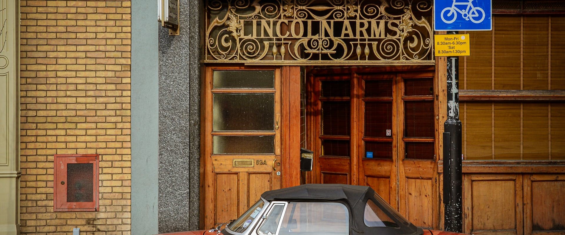 Traditional Lincoln coat of arms and heraldic detail from the city's historic quarter