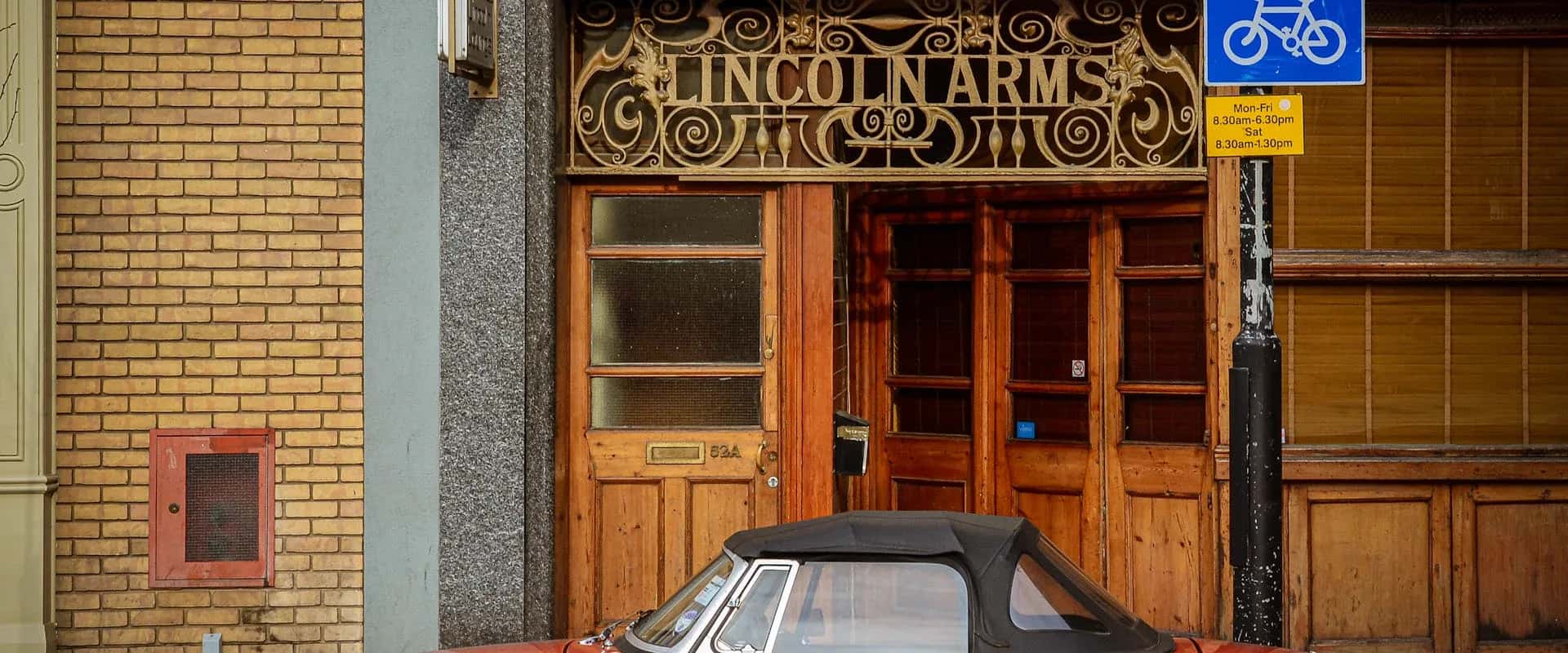 Traditional Lincoln coat of arms and heraldic detail from the city's historic quarter