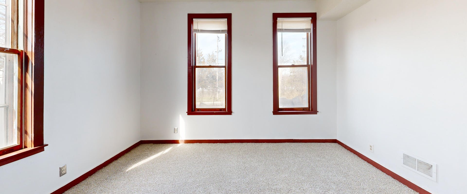 Bright empty room with fresh white walls — a rental property ready to let after a void turnaround